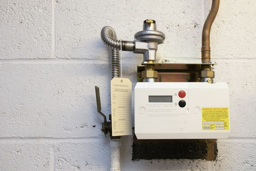 Gas meter and regulator on a wall